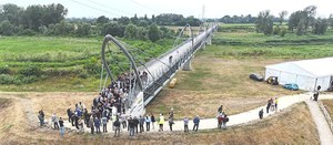Ciclovia del Reno. Inaugurata la condotta idraulica-ponte ciclopedonale che collega Trebbo e Calderara